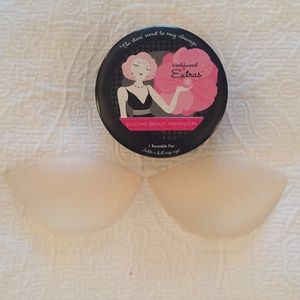 Silicone breast enhancers